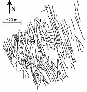 Detail map showing initial northwesterly oriented joint array which was subsequently sheared generally in a right-lateral sense producing splay fractures in N-NE orientation between adjacent sheared joints. There are a few younger enigmatic fractures in E-W orientation in the upper central part of the map indicating the changing sense of shear locally. The basic mechanism is the same as the mechanism determined at the Mt. Abboutt area. From Aydin et al. 2002.