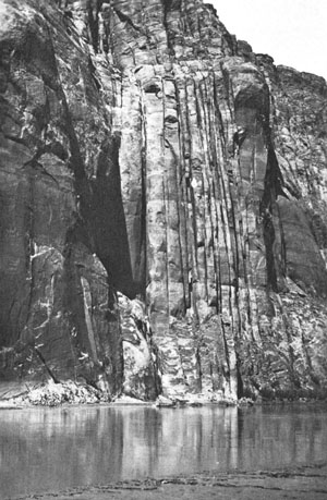 A wide fracture zone at the center of the photograph containing mostly vertical joints and perhaps some sheared joints (judging from the presence of some fractures at an angle to the vertical ones) on the Colorado River bank at Lees Ferry, Grand Canyon, AZ. From Billings (1972) with credit for E. C. LaRue.